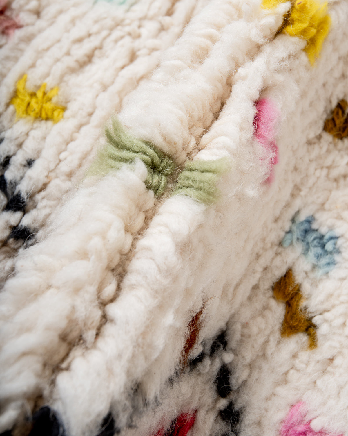 Modern, designer, handcrafted Berber rug from Morocco. Beniourain carpet with beautiful colours and patterns and fluffy wool texture.